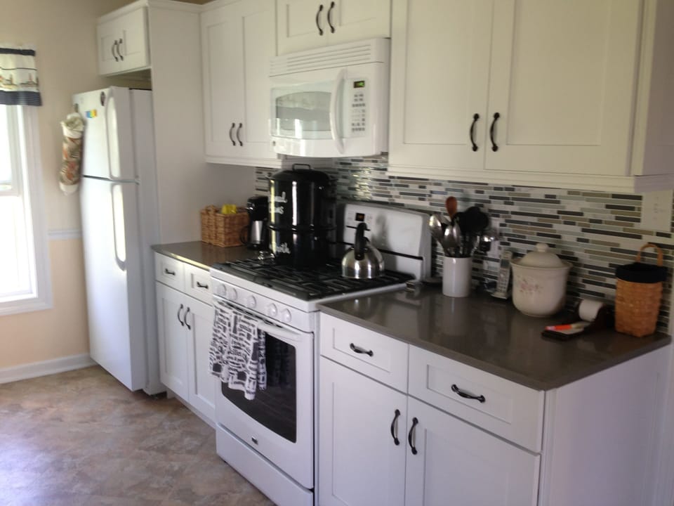 Remodeled Kitchen with gas stove, microwave, dishwasher, coffee maker, 