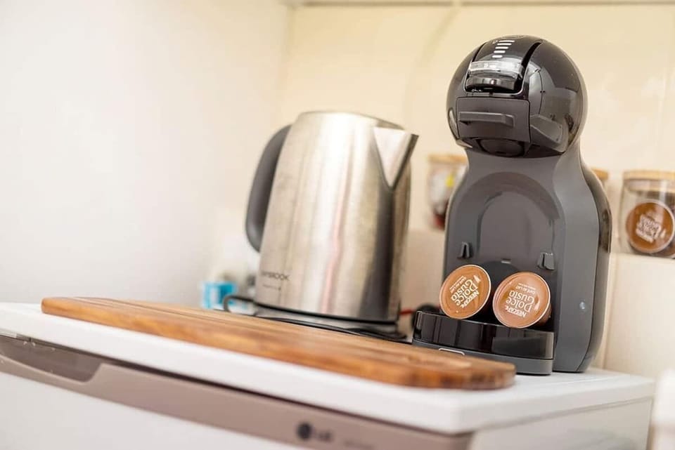 Enjoy your morning coffee with our convenient coffee amenities. Start your day right with a fresh brew, easily prepared in your accommodation.