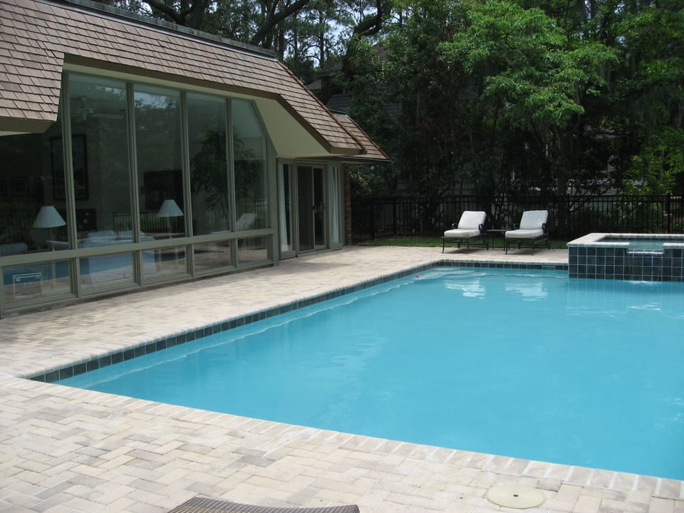 Living room overlooking pool and spa
