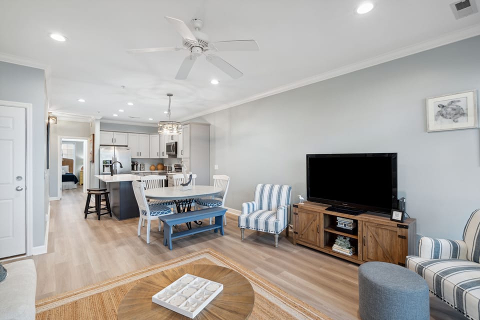 Perfect to entertain while you visit, the open concept kitchen, dining room and living room all lead into each other.