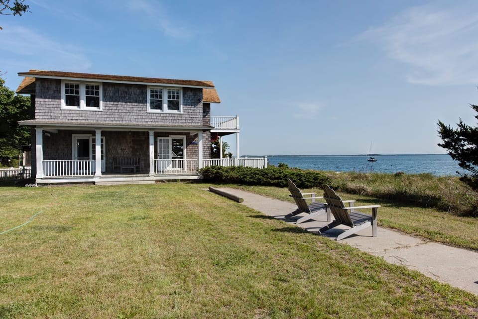 Bayside Cottage — the lawn, the buffer, the bay
