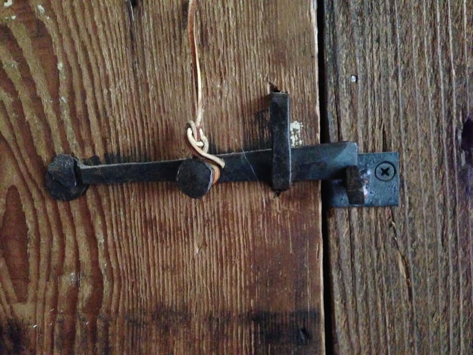 Blacksmith-Forged Door Hardware Throughout Second Floor