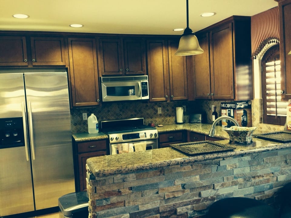 Kitchen with all stainless steel appliances.