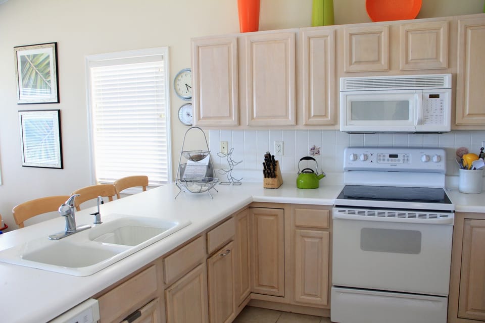 Kitchen in the great room. Look out at the ocean as you talk to your guests.  