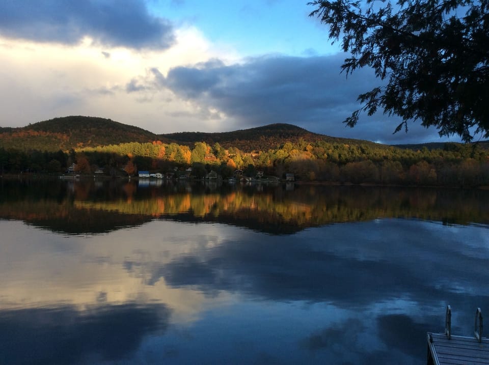 later afternoon fall color over the lake as viewed from the cottage
