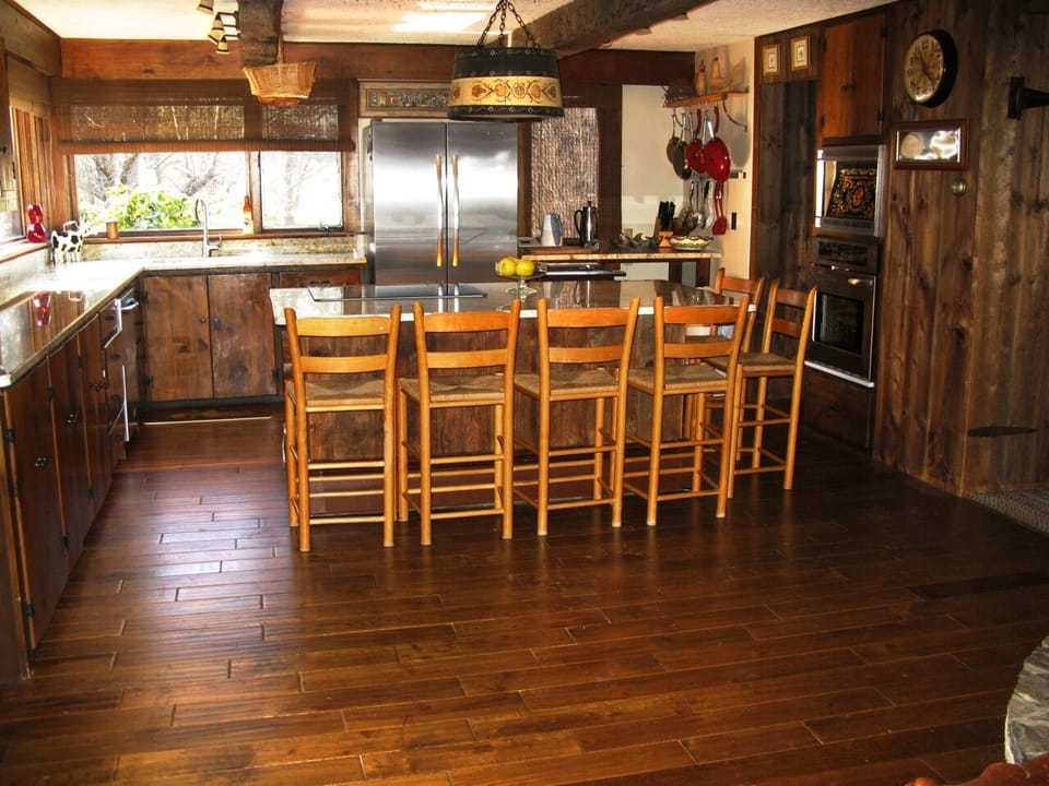 Brand new kitchen with stainless steel appliances and granite counter-tops.
