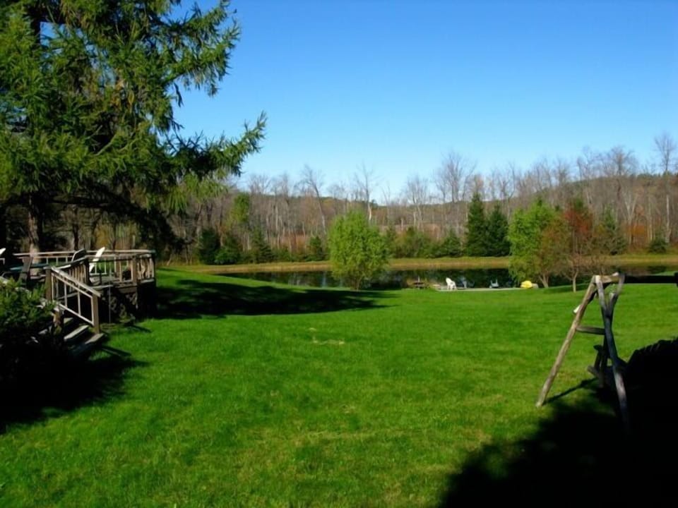 Lawn/Pond from swinging wooden loveseat