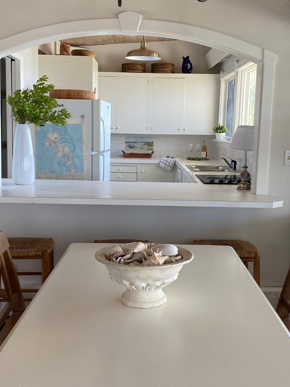 Pass through to counter seating and dining table makes meals convenient