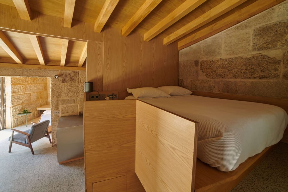 Double bed on mezzanine, on top of the shower room.