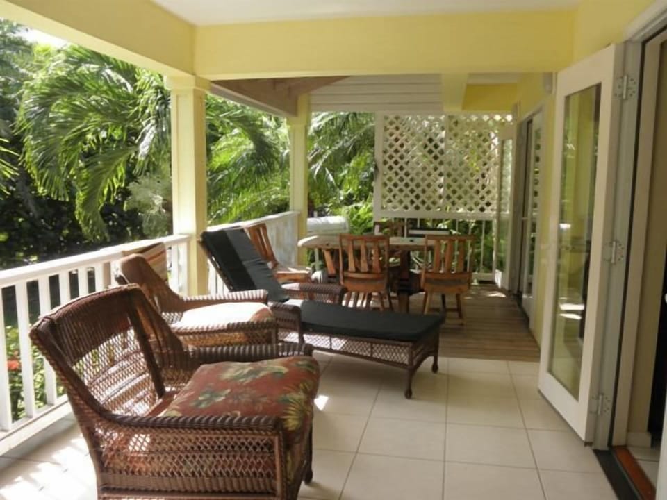 Enjoy the Caribbean breeze while you dine or relax on the large porch.