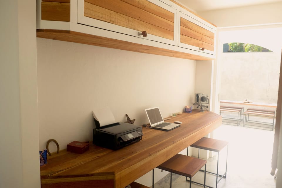 Custom built cedar office with room for 3 to work comfortably. 