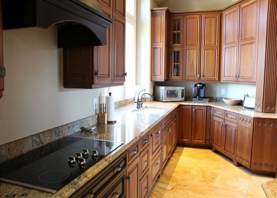 Large stocked kitchen with spices, condiments, oils, coffee. Paper products. 