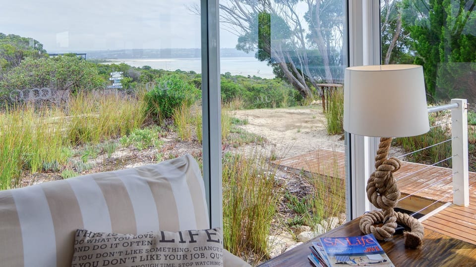 Cosy up in the corner leather lounge with a book and just watch the ocean.