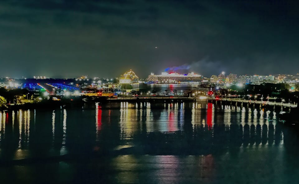 Port of old San Juan at night from libing room and bedroom