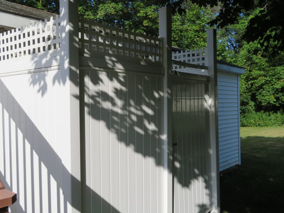 Spacious outdoor shower.  Perfect for after the beach.