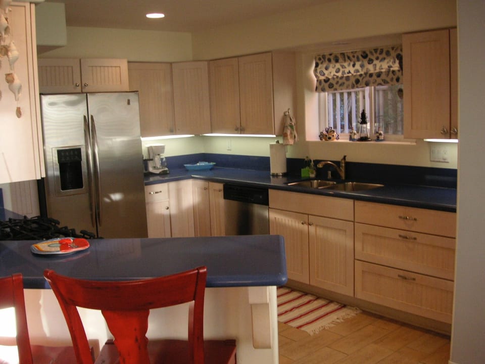 Spacious kitchen fully supplied with cookware, silverware & dishes 