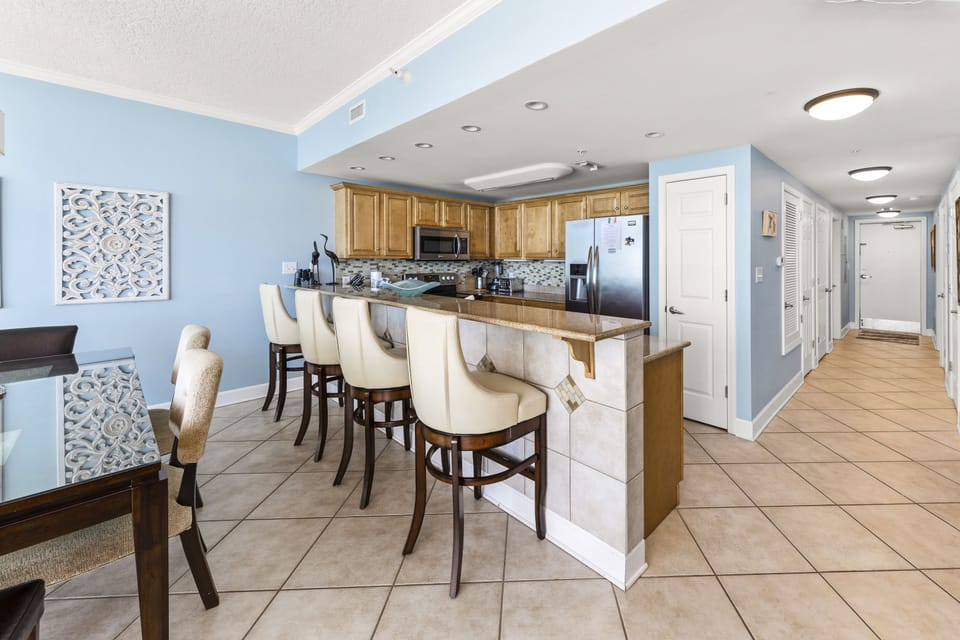 Large Swivel Barstools and Stainless steel appliances