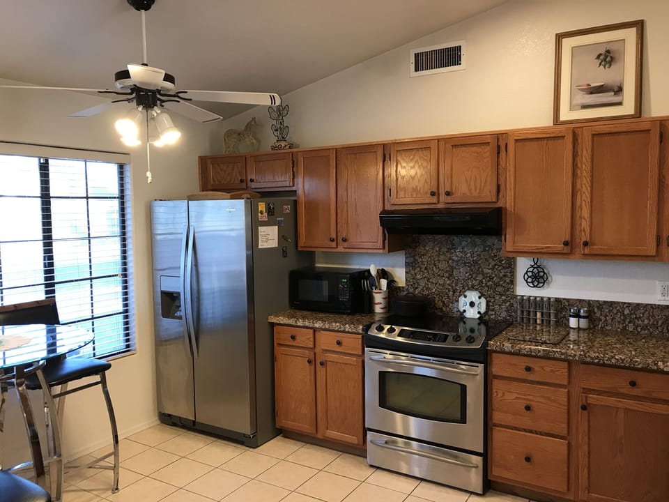 Kitchen has stainless appliances. Refrig w/filtered ice.Filtered water spigot.