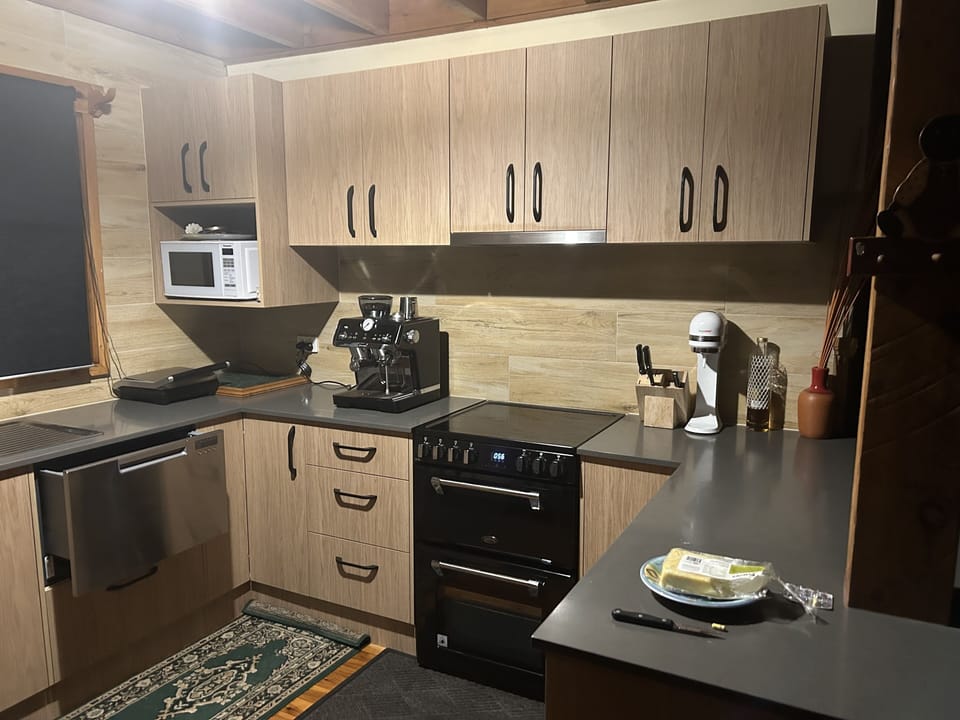 New kitchen pic with coffee machine & new electric oven with Induction cooktops