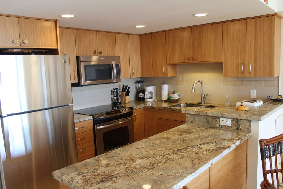 Upscale kitchen with bamboo, granite and stainless steel