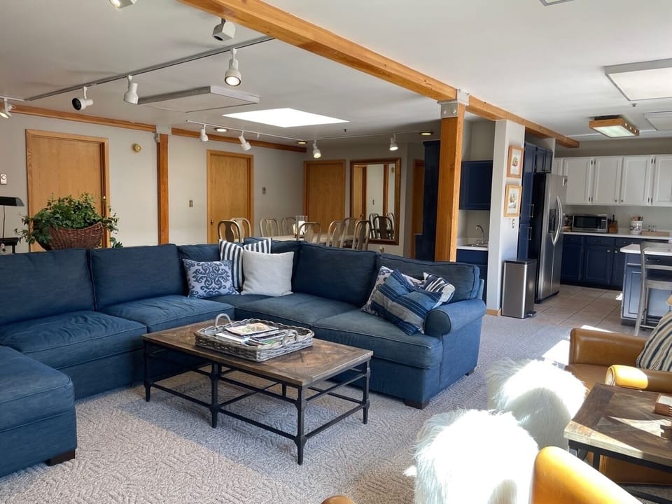 Relax with your friends and family in the open concept living room.