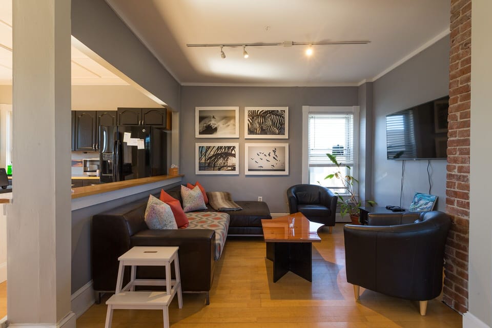 The living room area and TV with the yacht deck coffee table