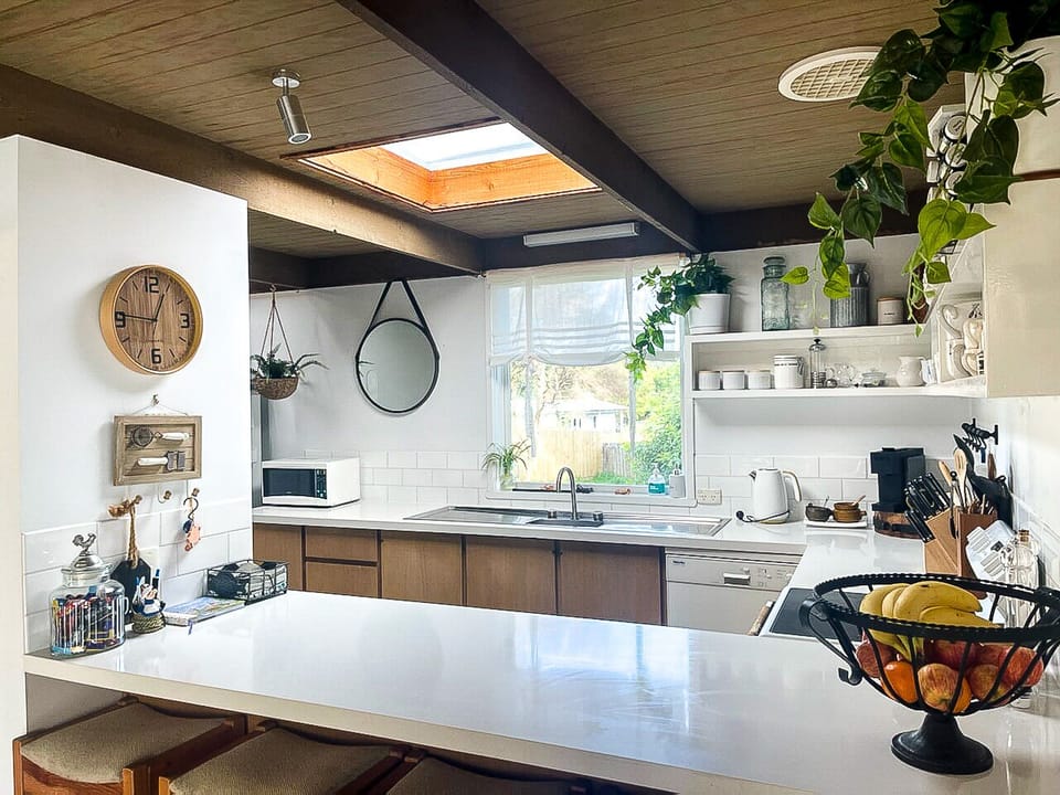 Kitchen , stone benches, coffee machine ( pods provided) and extra amenities