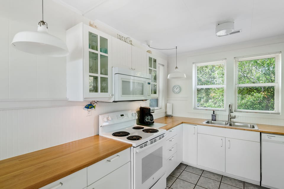 Fully Equipped Kitchen. Electric range/oven. Microwave. 12-cup coffee maker. 