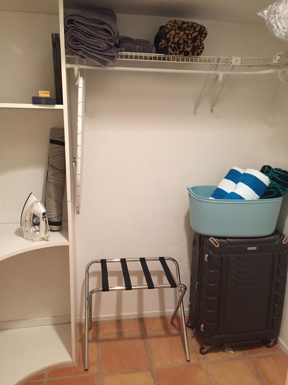 Large walk in closet with plenty of storage 