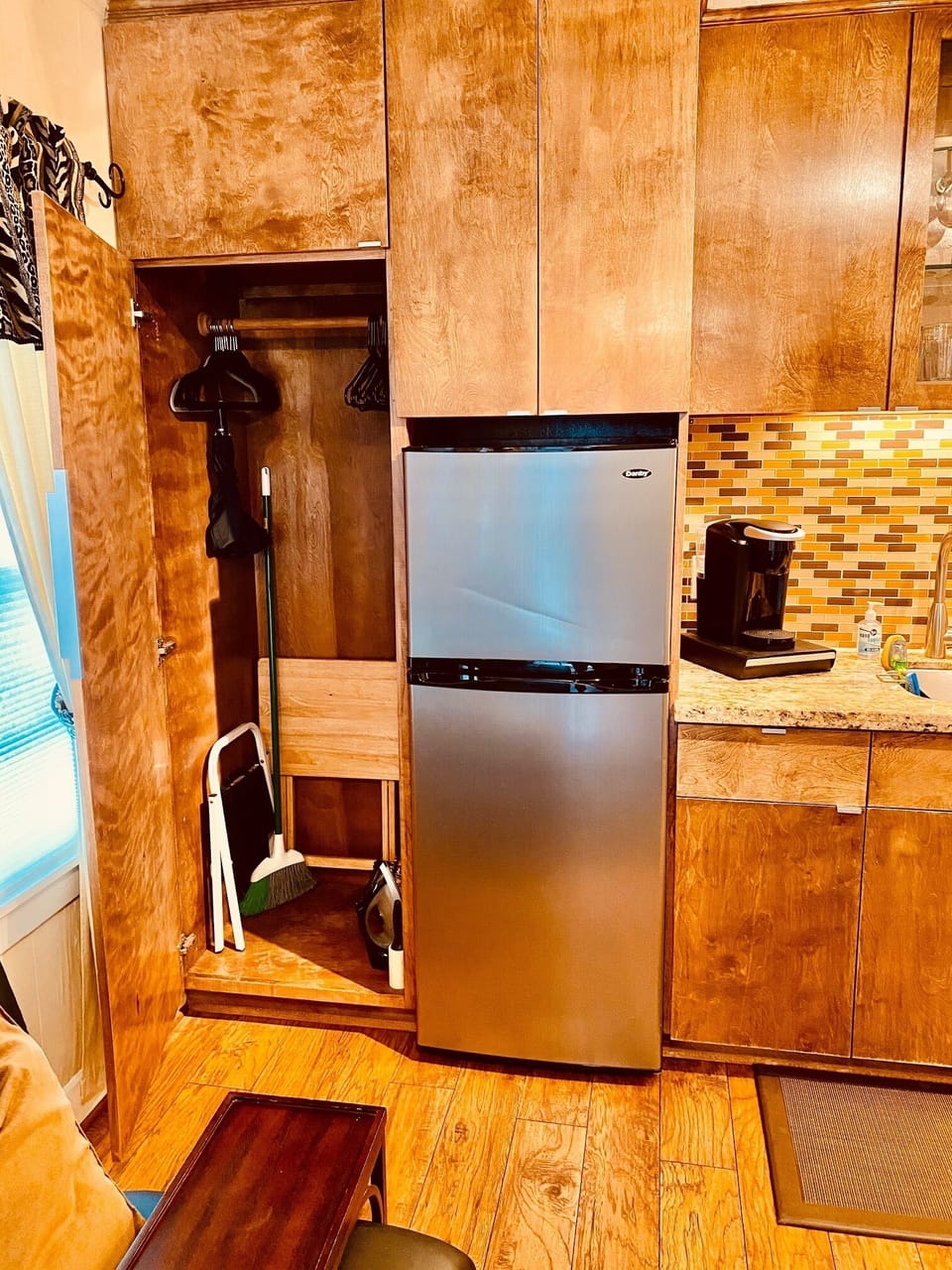 This is your closet next to the refrigerator!