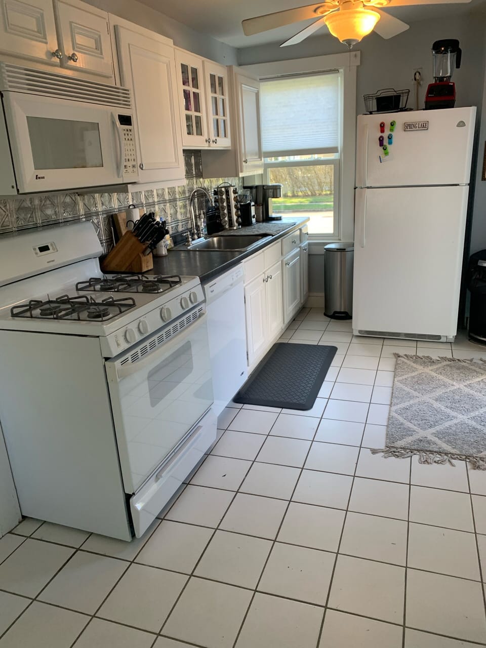 Kitchen. New kurig machine, spice rack, mixer and others 