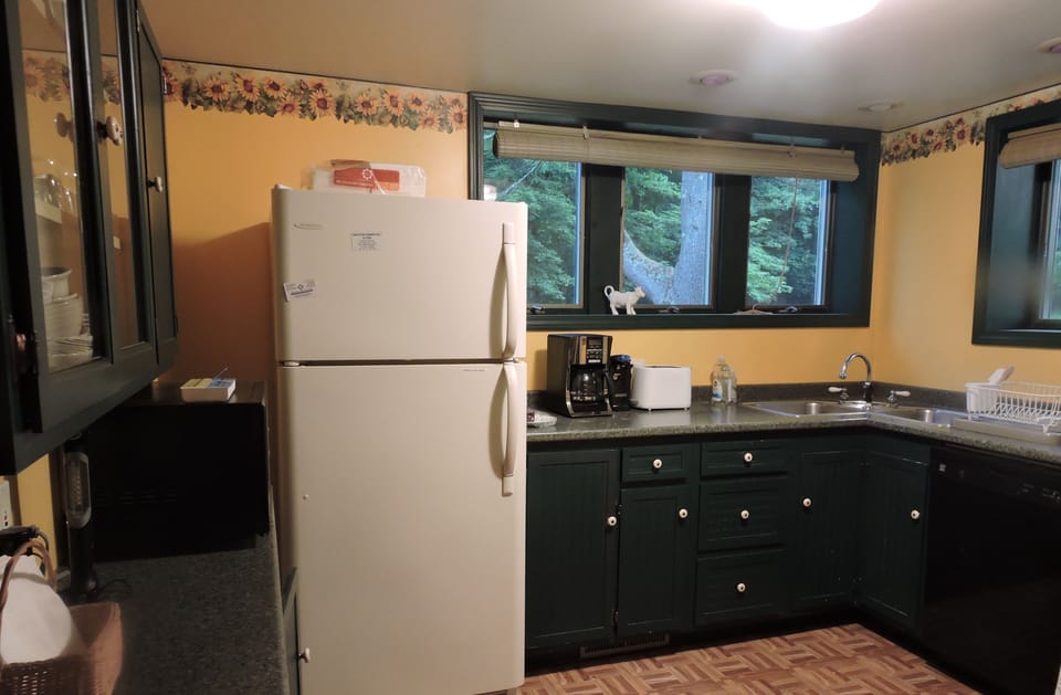 Roomy kitchen is fully stocked