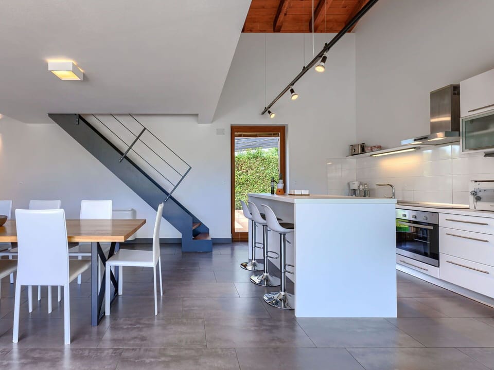 Furniture, Cabinetry, Countertop, Building, Table, Kitchen, Wood, Lighting, Flooring, Chair