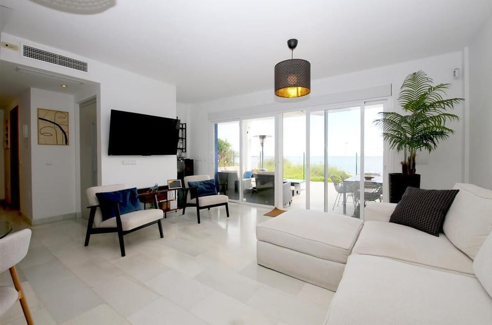 Modern living room with direct access to the terrace and air conditioning