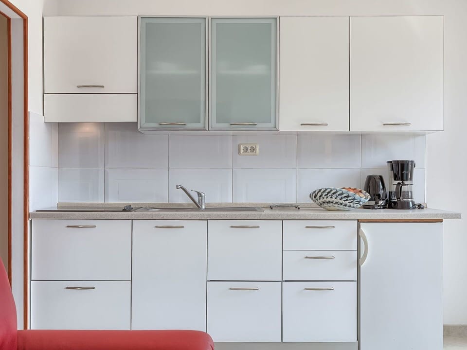 Countertop, Furniture, Cabinetry, Room, Kitchen, Drawer, Cupboard, Property, Chest Of Drawers, Interior Design
