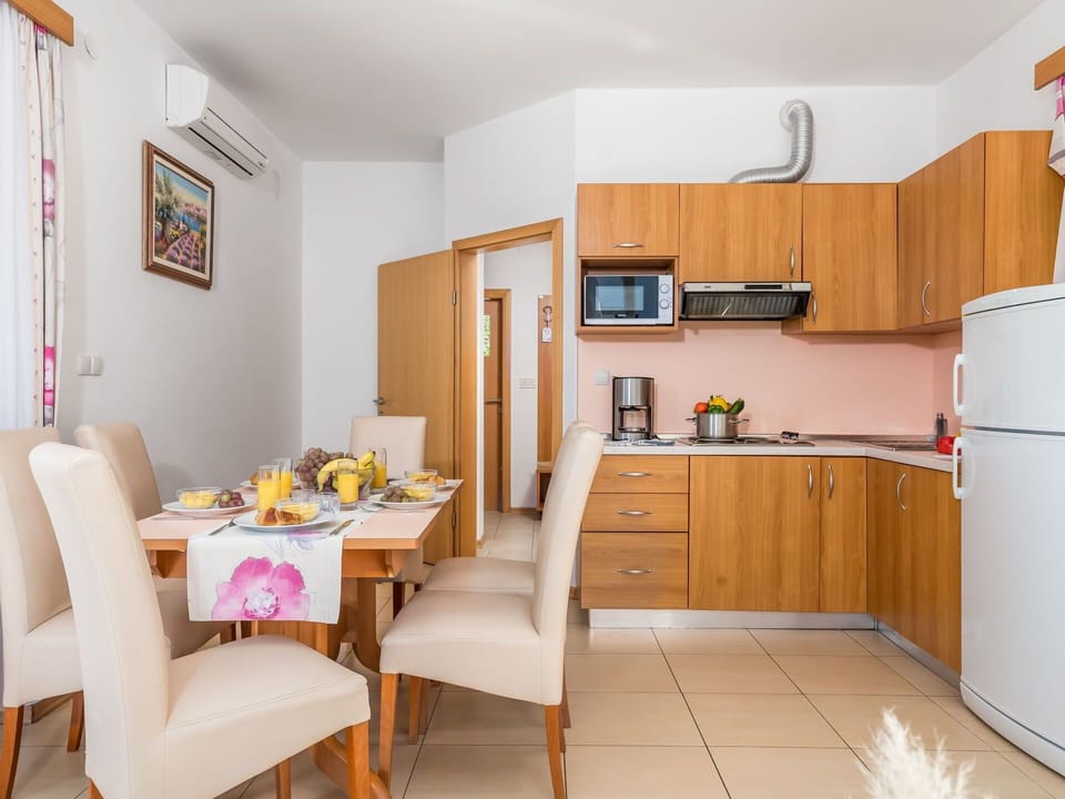 Room, Furniture, Property, Interior Design, Building, Yellow, Floor, Kitchen, House, Orange