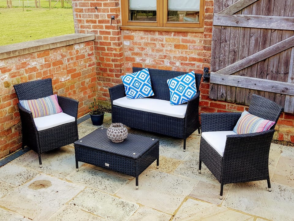 Courtyard patio seating. Access by patio doors from Kitchen and sitting room 