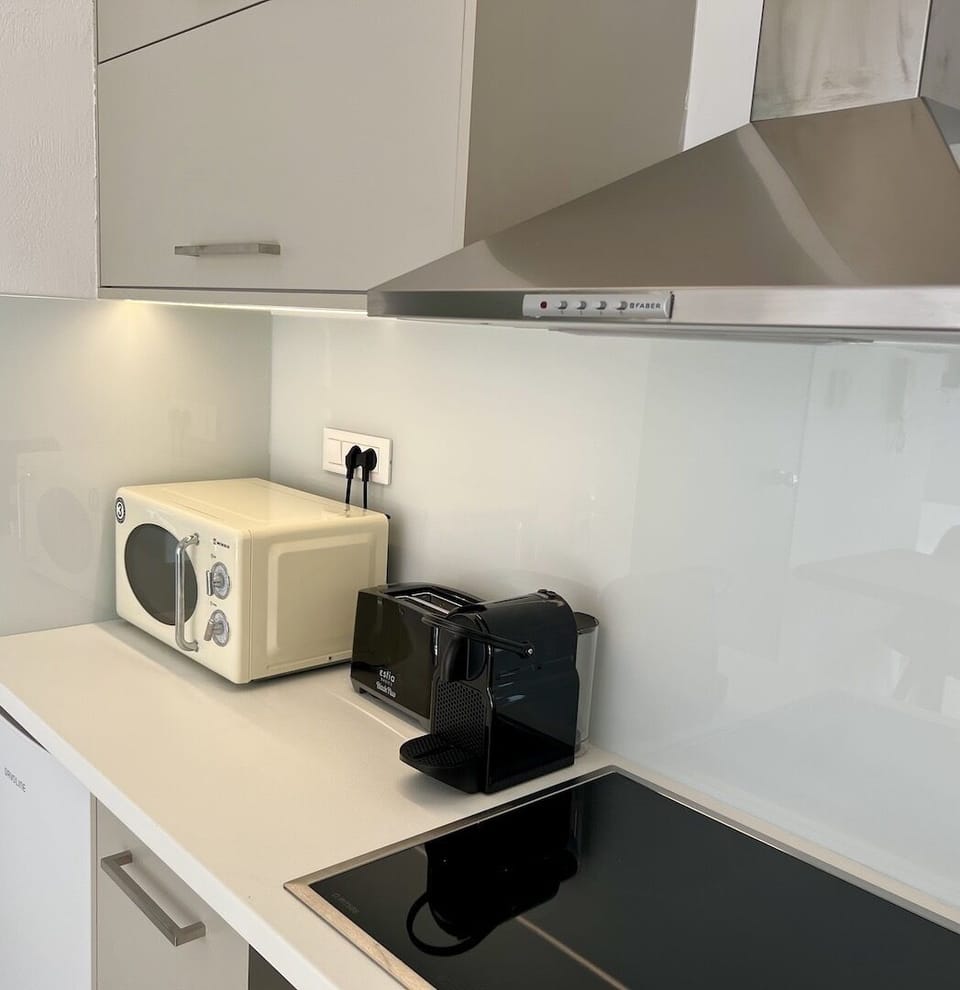 Krupps coffee machine, microwave, toaster