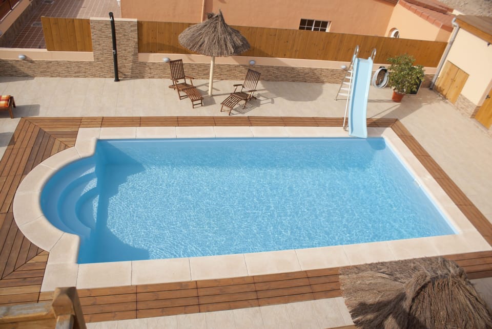 Pool slide take from roof terrace above