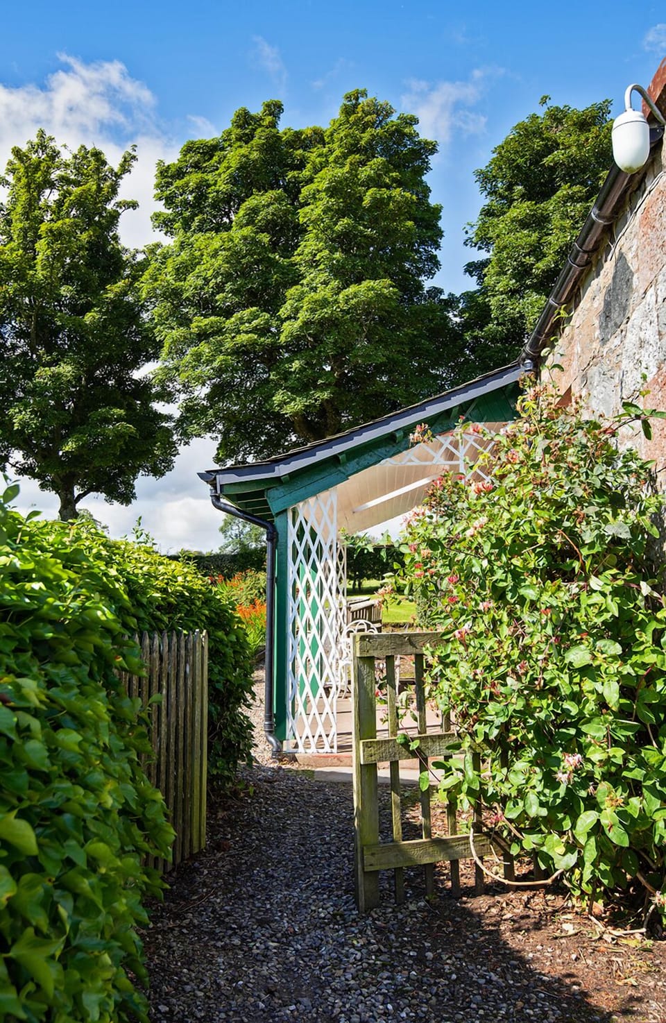 Garden gate leading to the veranda
