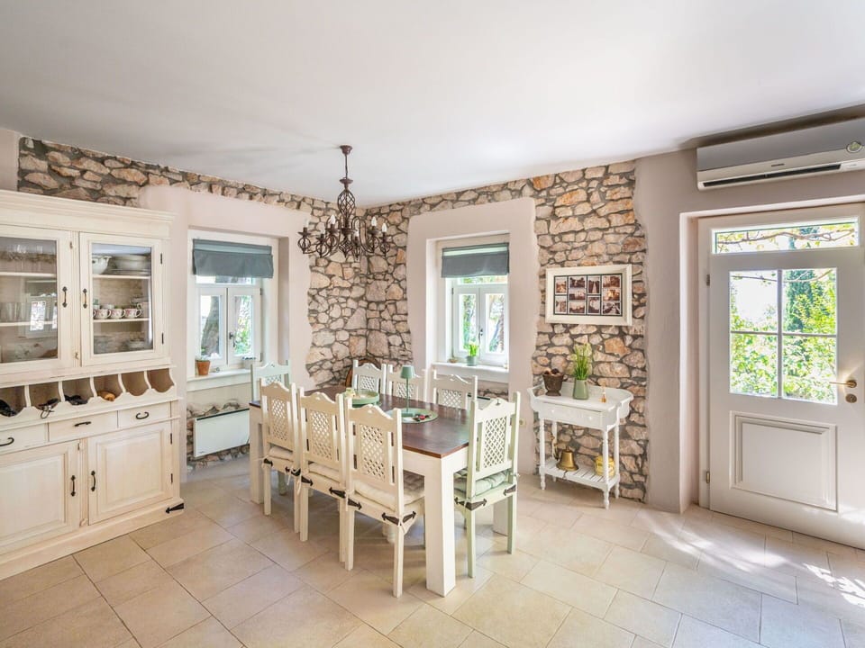 Property, Furniture, Window, Houseplant, Table, Picture Frame, Cabinetry, Wood, Shelf, Shelving