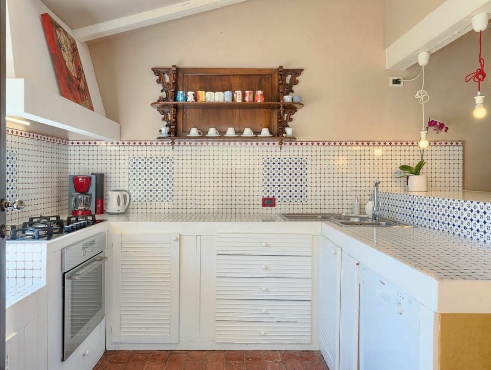 Cabinetry, Countertop, Property, Wood, Drawer, Kitchen, Interior Design, Lighting, Kitchen Stove, Flooring