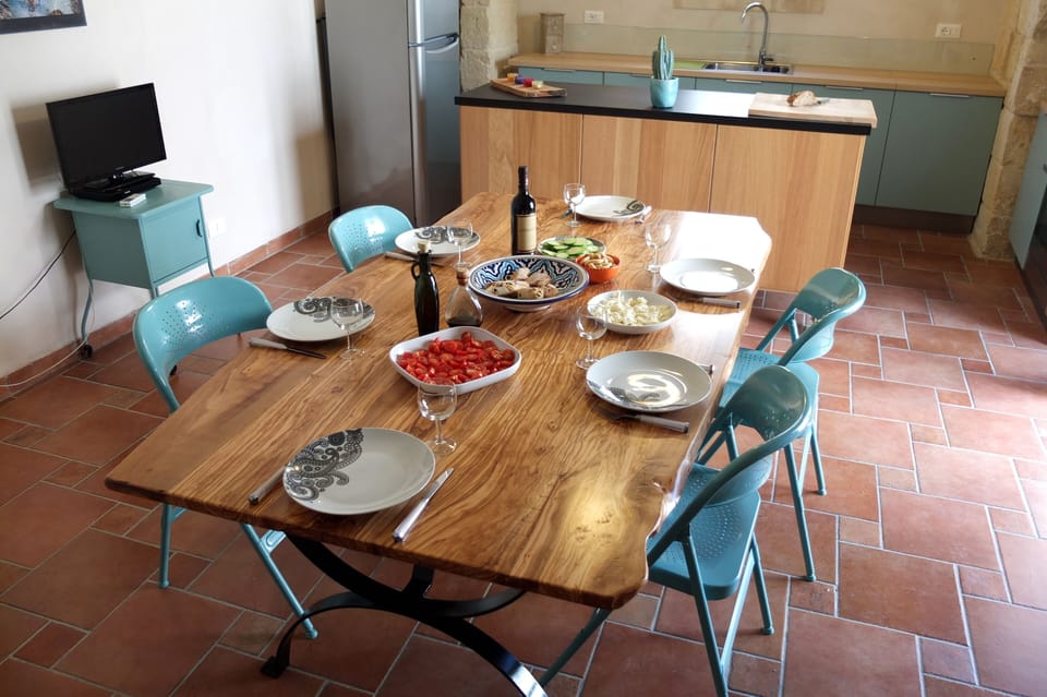 Olive wood table made by Prezioso the carpenter