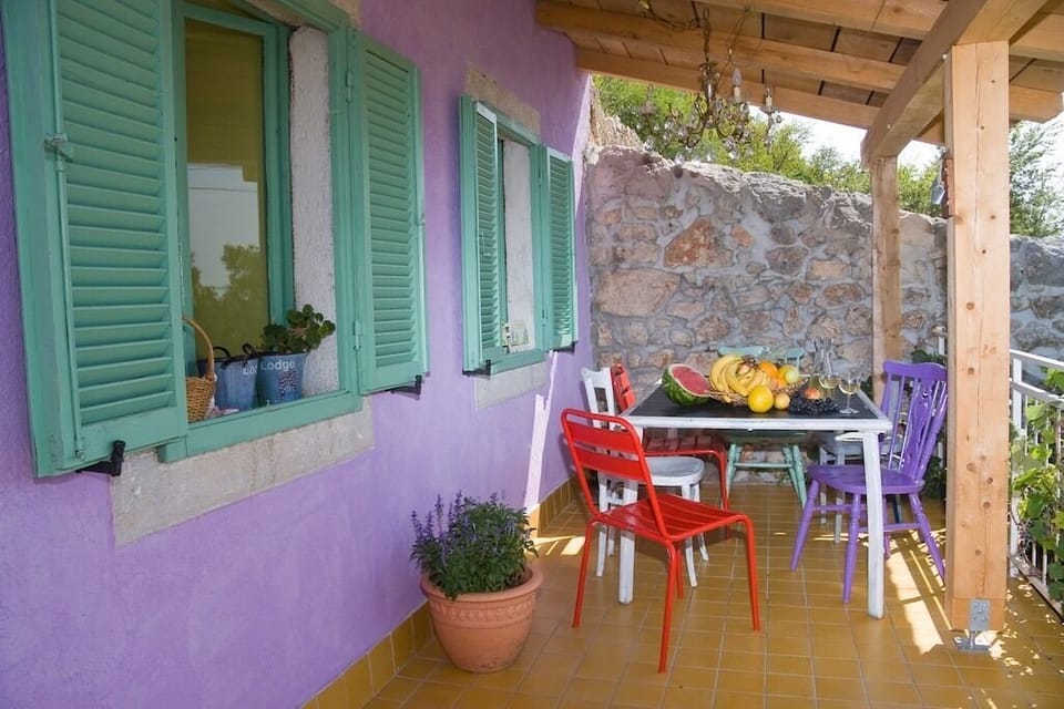Romantic porch with a large table