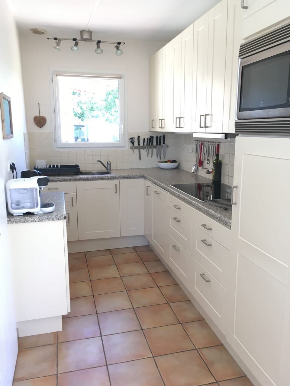 Kitchen with view to enclosed front driveway