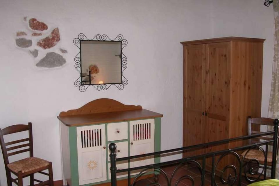 Detail in upstairs bedroom with ensuite bathroom. Villa To Kyma, Stoupa.