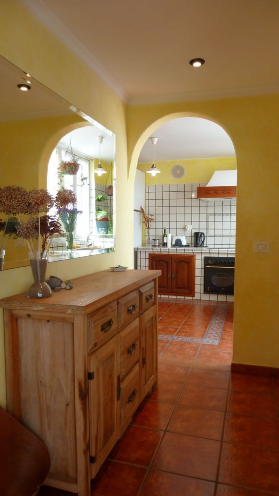 the floor from the living room to the kitchen
