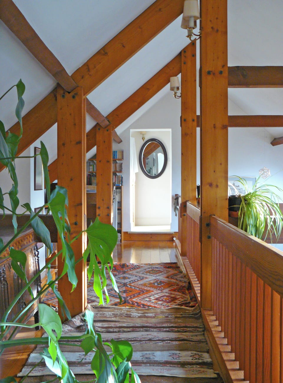 Back along gallery with large desk to twin bedroom and stairs