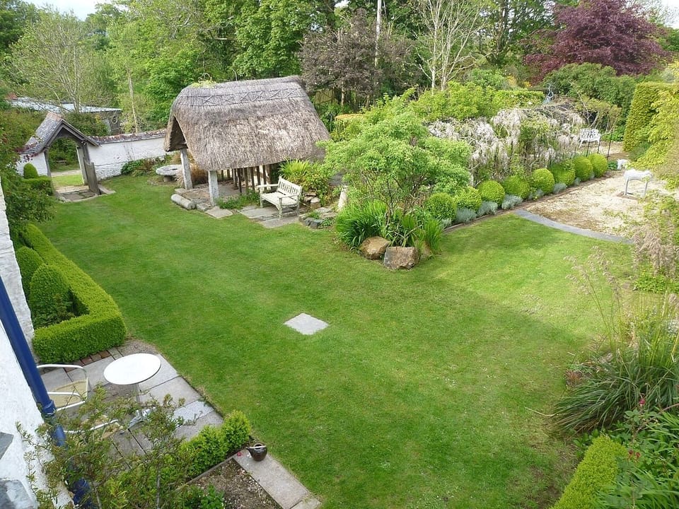 The patio and garden in front of the  Cottage