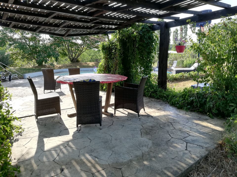 Shaded area by the pool for eating al fresco or just relaxing